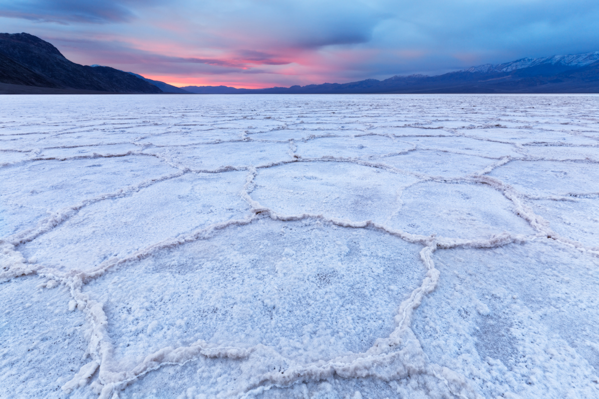 Badwater Basin is a salt flat adjacent to the Black Mountains that descends to the lowest point in North America 279 feet below sea level. The expanse of water is made up of pure table salt.  Death Valley National Park, California