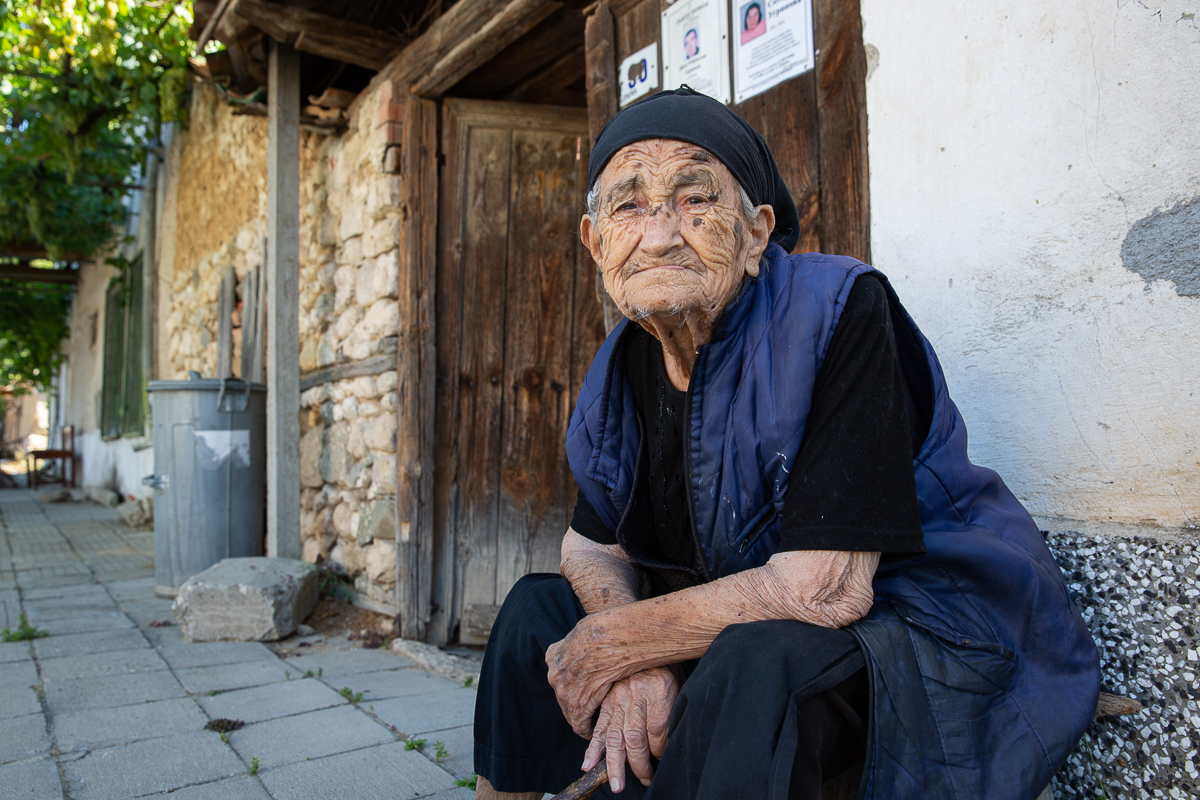 Elderly woman poses for photographers on our Bulgaria Photography Tour